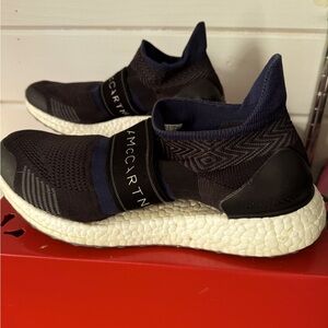 Adidas by Stella McCartney navy slip-on.